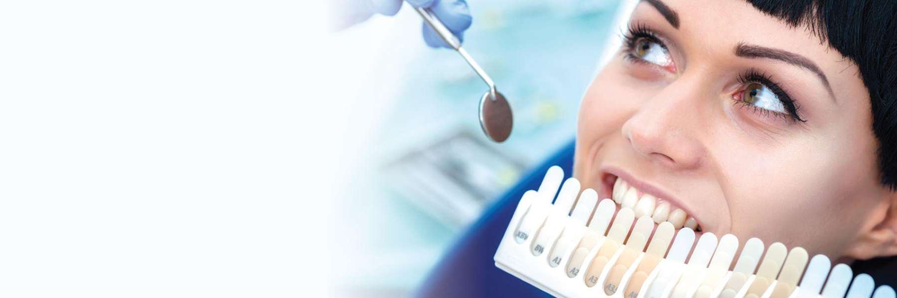 Dentist cleaning teeth
